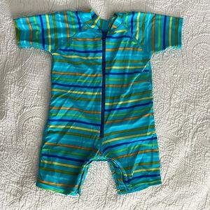 iPlay baby swimsuit. With 50 SPF, sized 3-6 months. 10-18lbs.